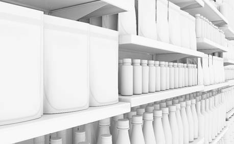 White bottles lined up on white shelves